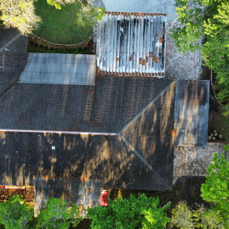 Before roof cleaning drone shot