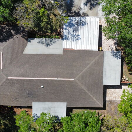 After shingle roof clean drone shot 